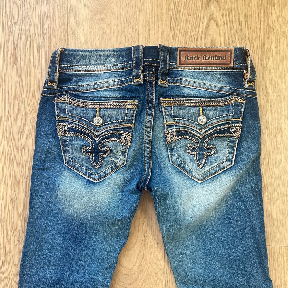 Rock Revival Women's Distressed Blue Bootcut Jeans with Embroidered Pockets